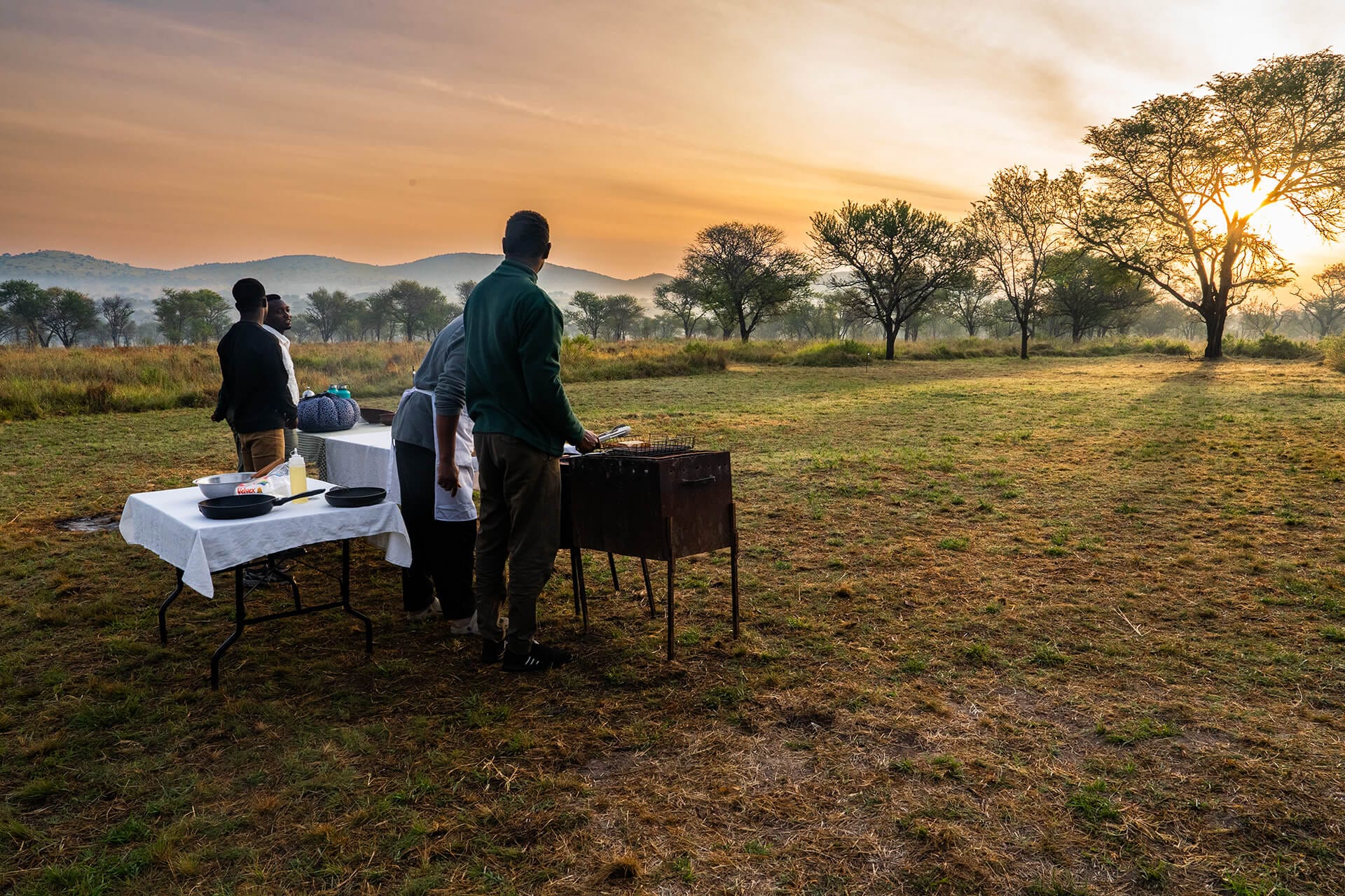 The lovely staff in our partner property preparing for Bush breakfast in East Africa