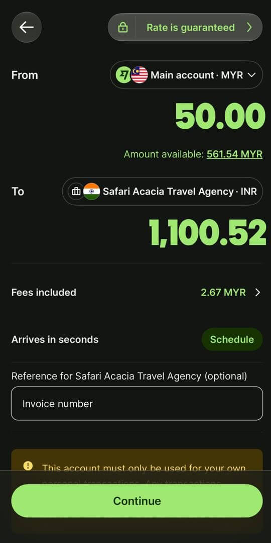 Wise amount screen with exchange rate, fees and the invoice number reference