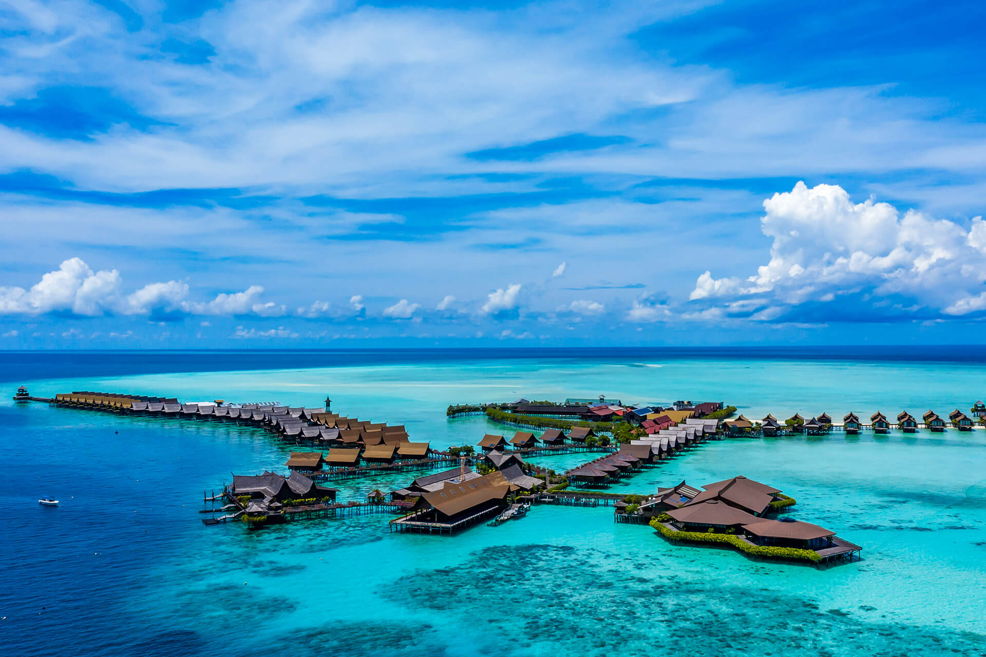 Wooden walkway connecting the stilted chalets at Sipadan Kapalai